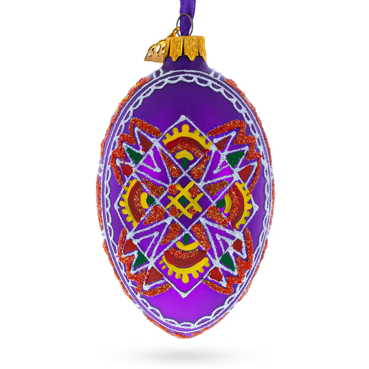 a purple ornament with a gold and red design