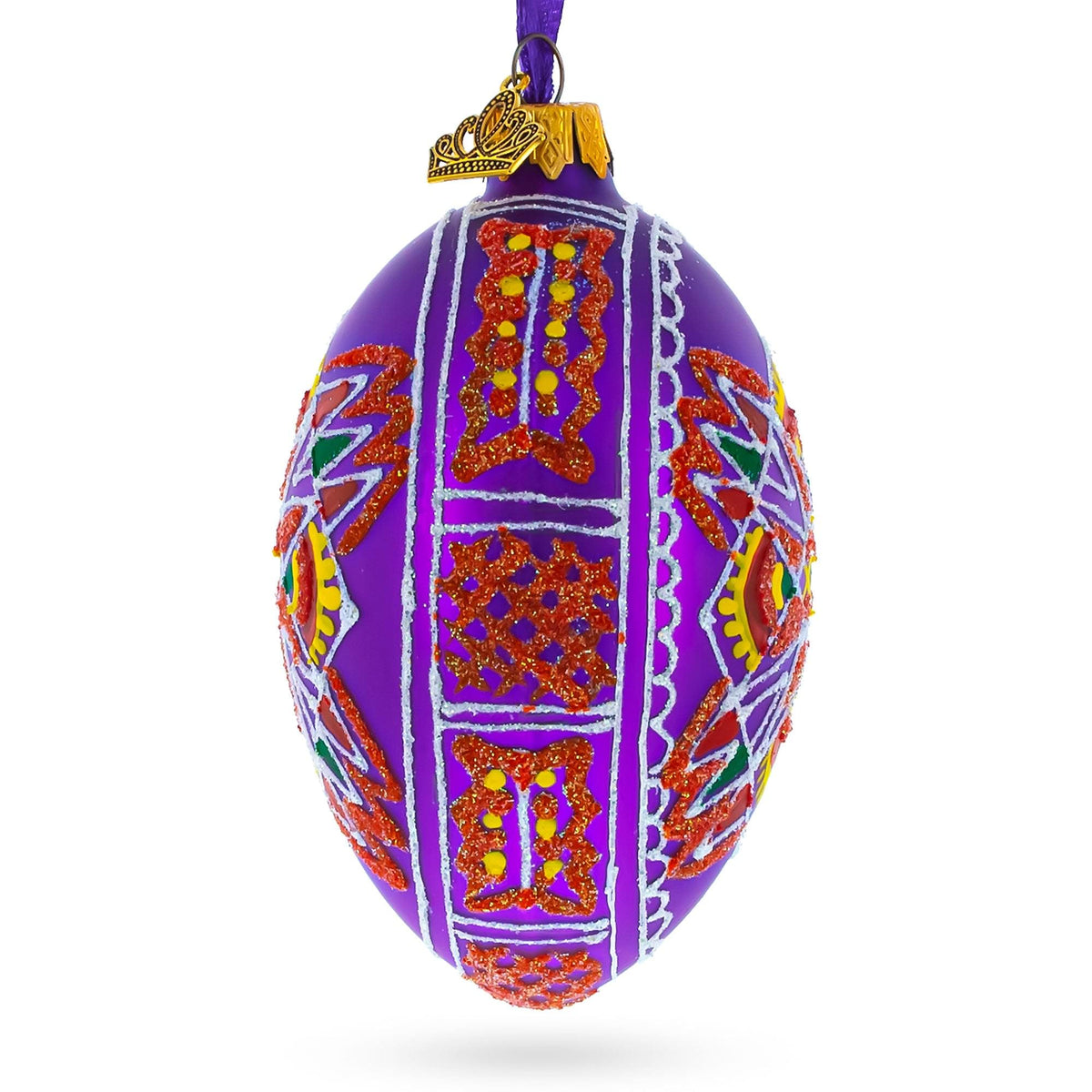 a purple and gold decorated egg