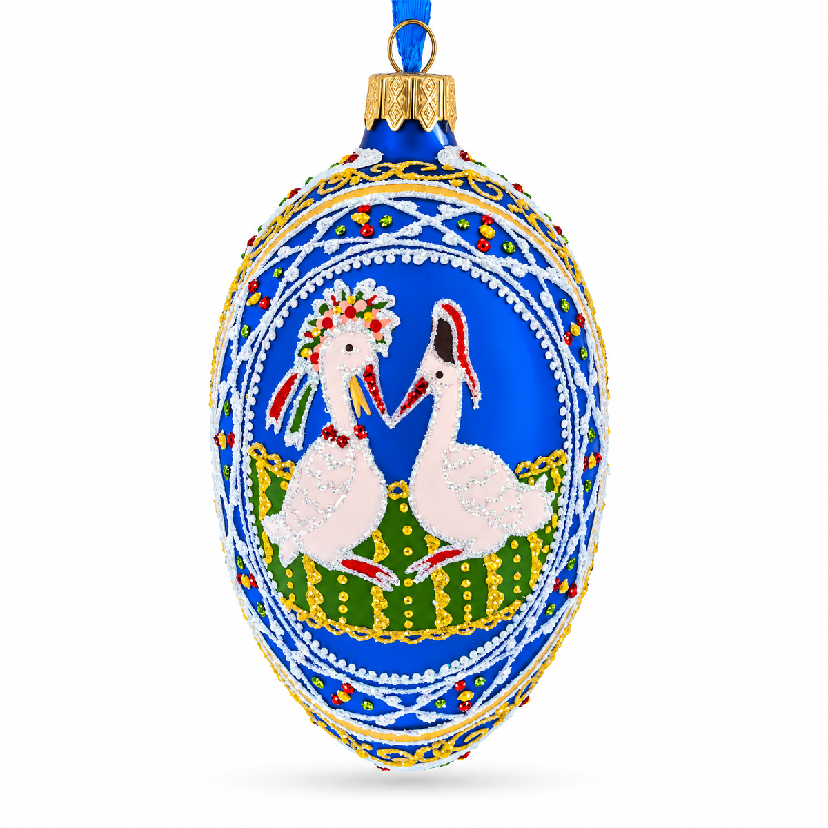a blue and gold decorated egg