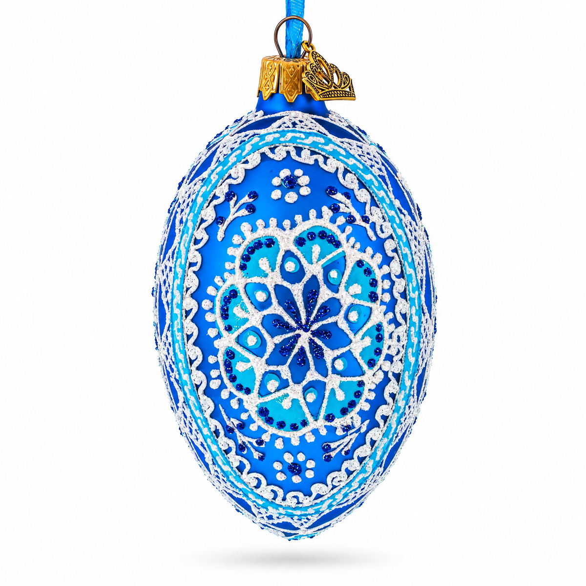 a blue and white decorated christmas ornament