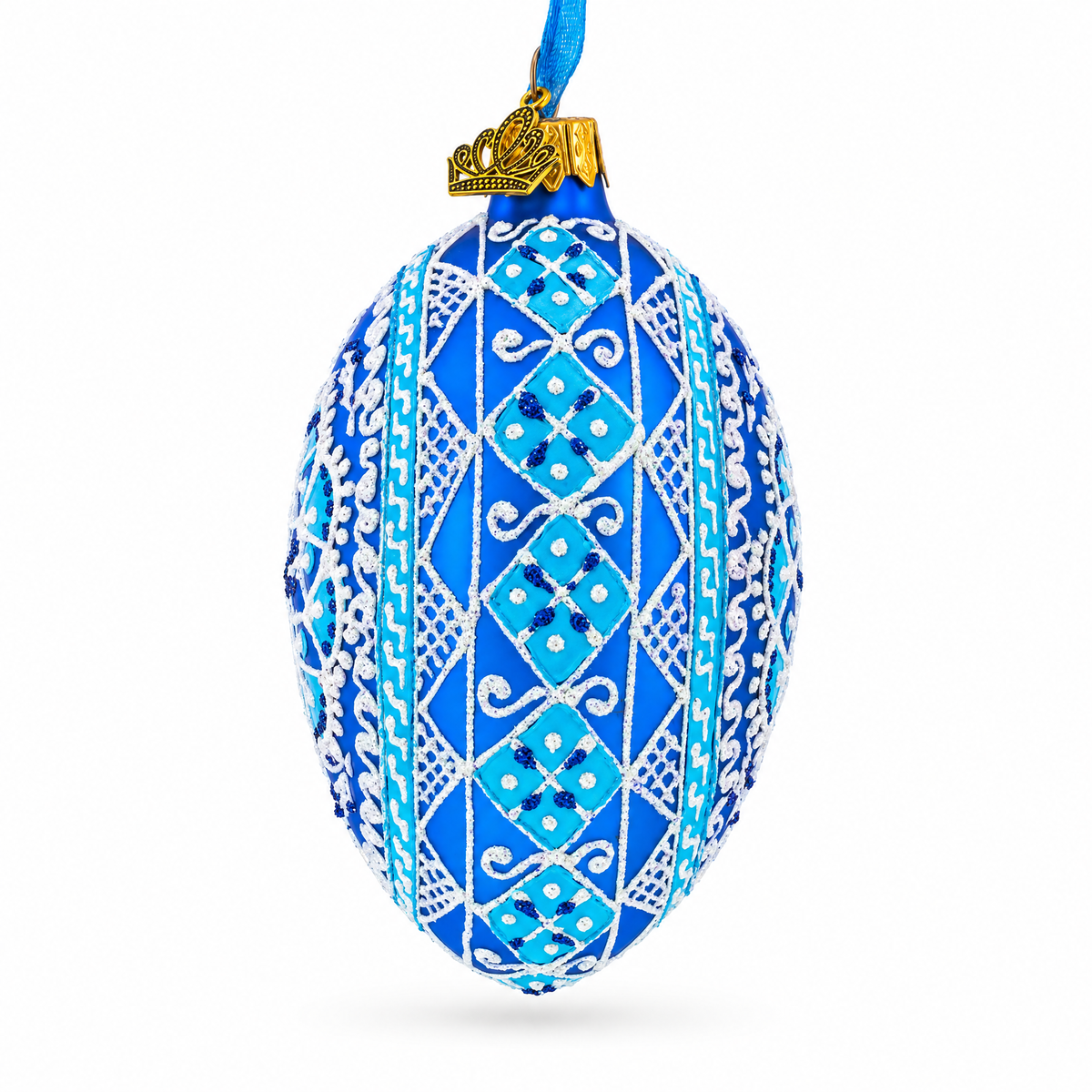 a blue and white decorated egg