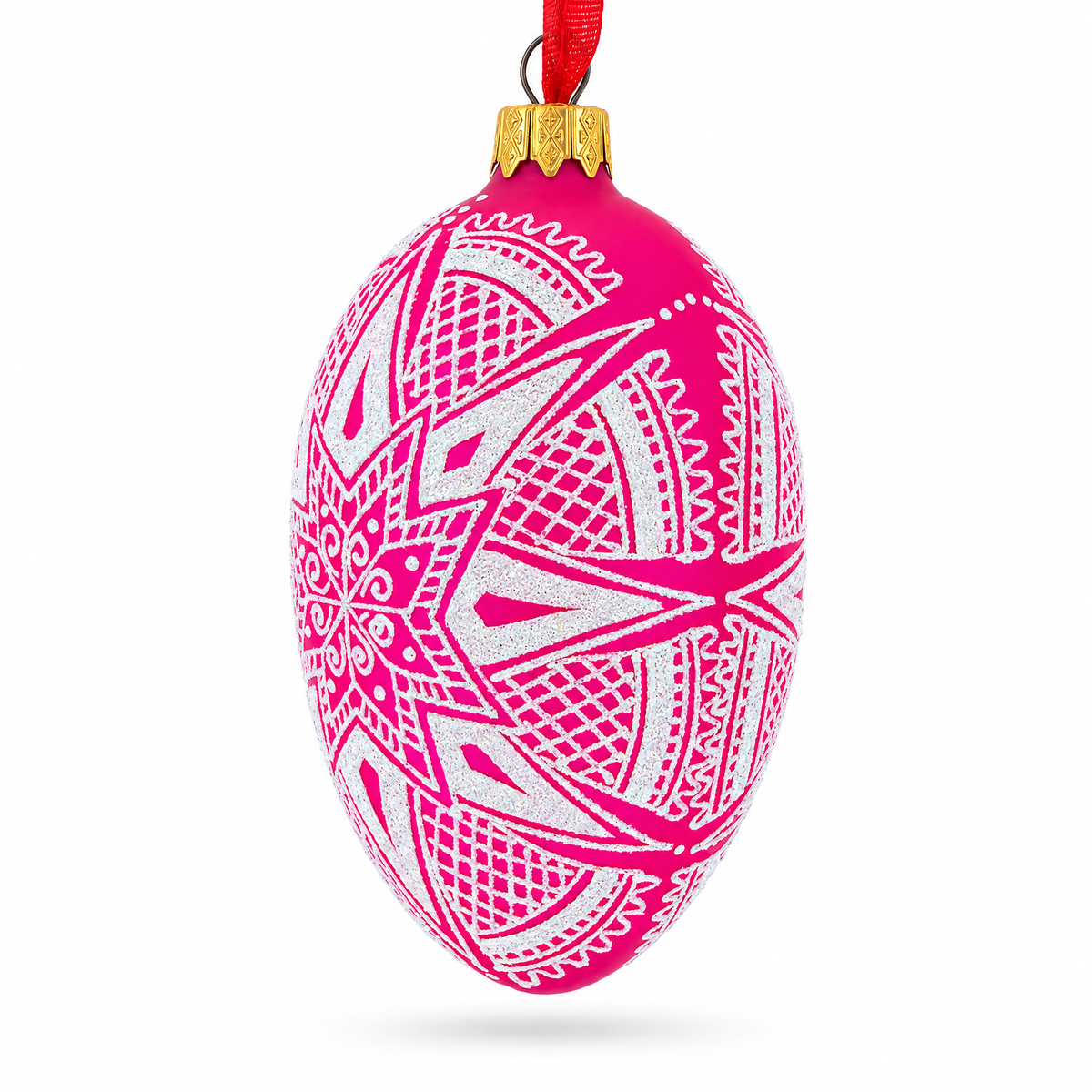 a pink and white decorated egg ornament