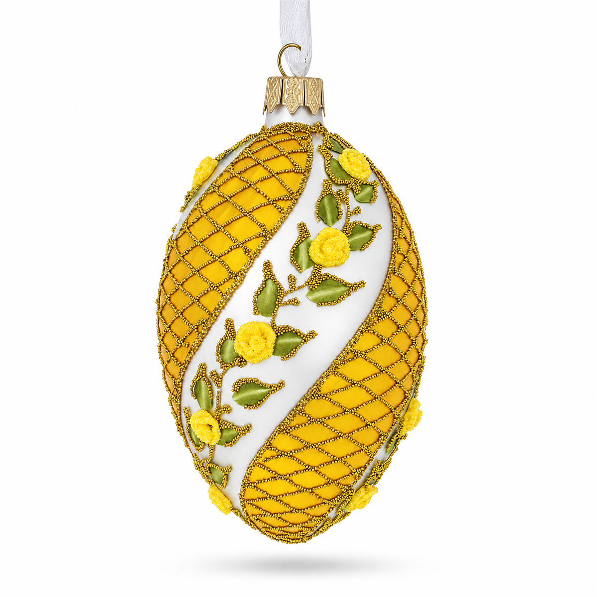 a yellow and white decorated egg
