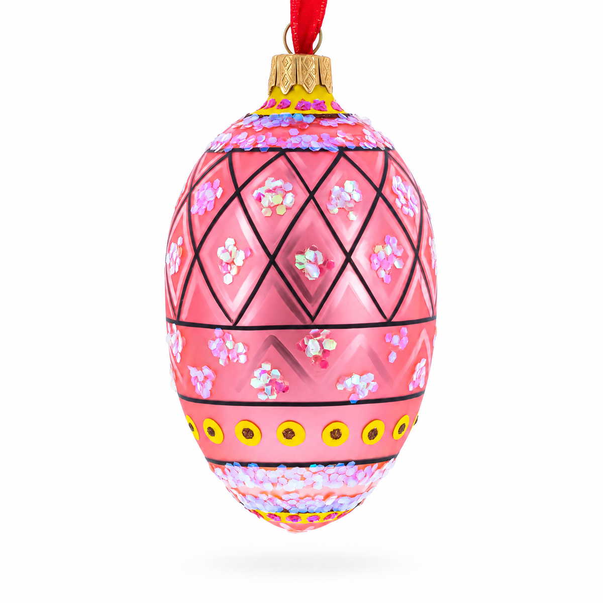 a pink decorated egg shaped christmas ornament