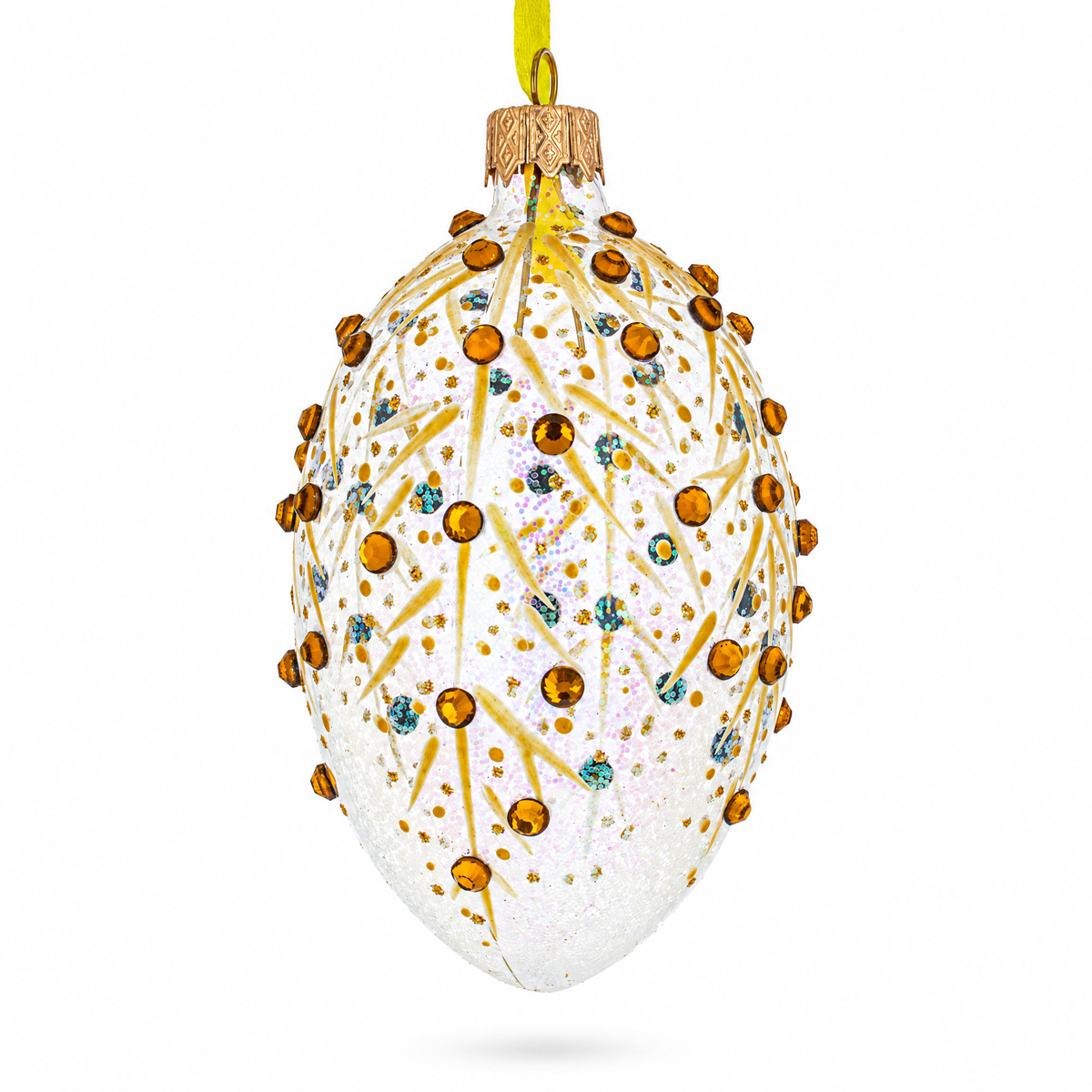 a white and gold decorated egg