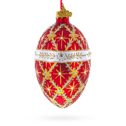 a red and gold decorated egg ornament