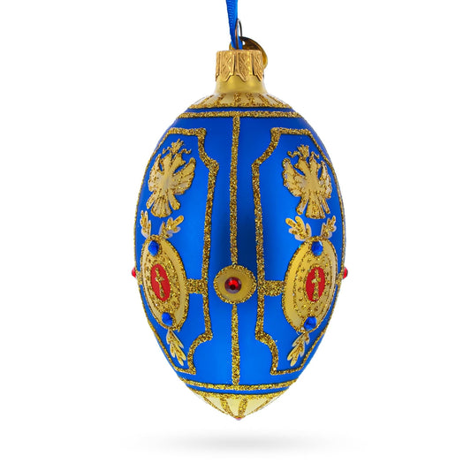 a blue and gold decorated christmas ornament