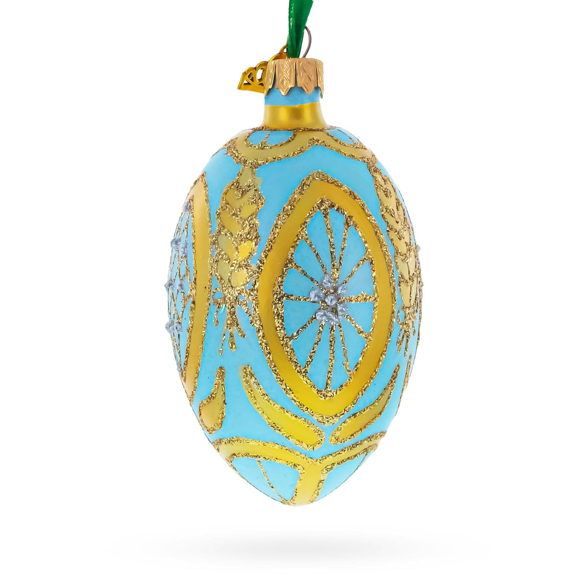 a blue and gold decorated egg ornament