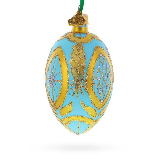 a blue and gold decorated christmas ornament