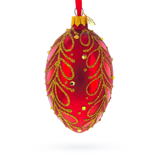 a red and gold christmas ornament