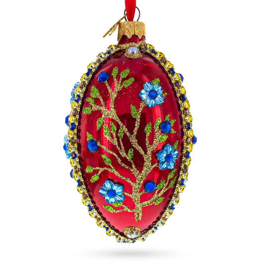 a red and gold decorated christmas ornament