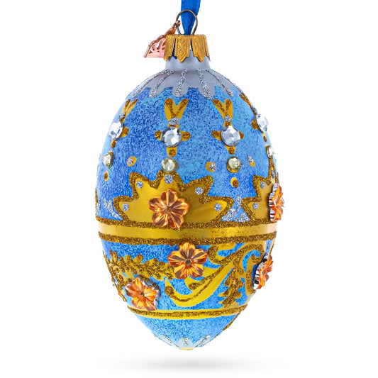 a blue and gold decorated egg