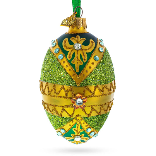 a green and gold decorated egg