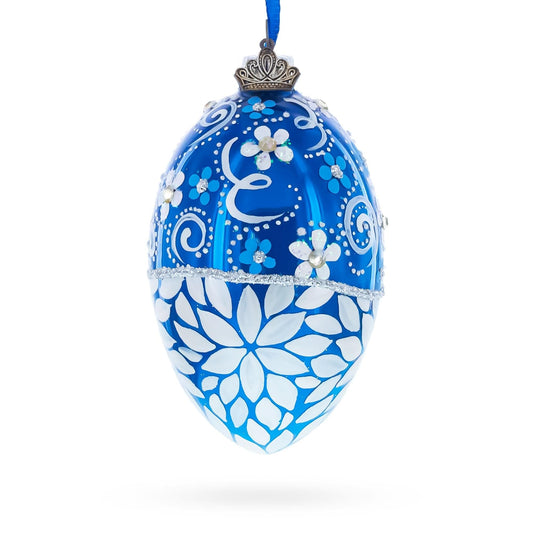a blue and white decorated egg