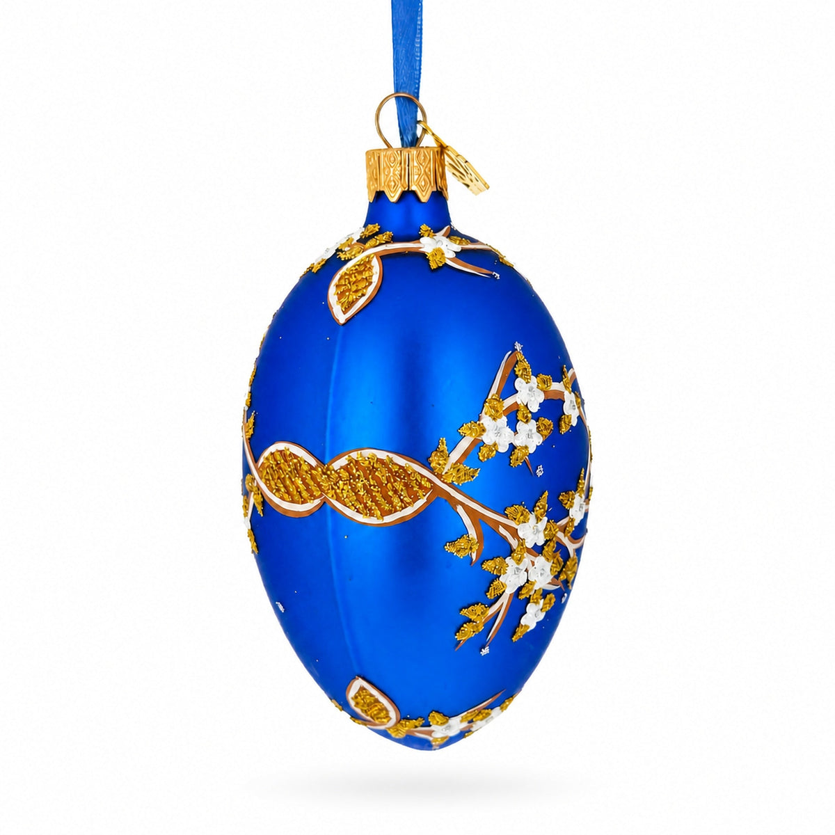 White Blossom Branch on Blue Glass Egg Ornament