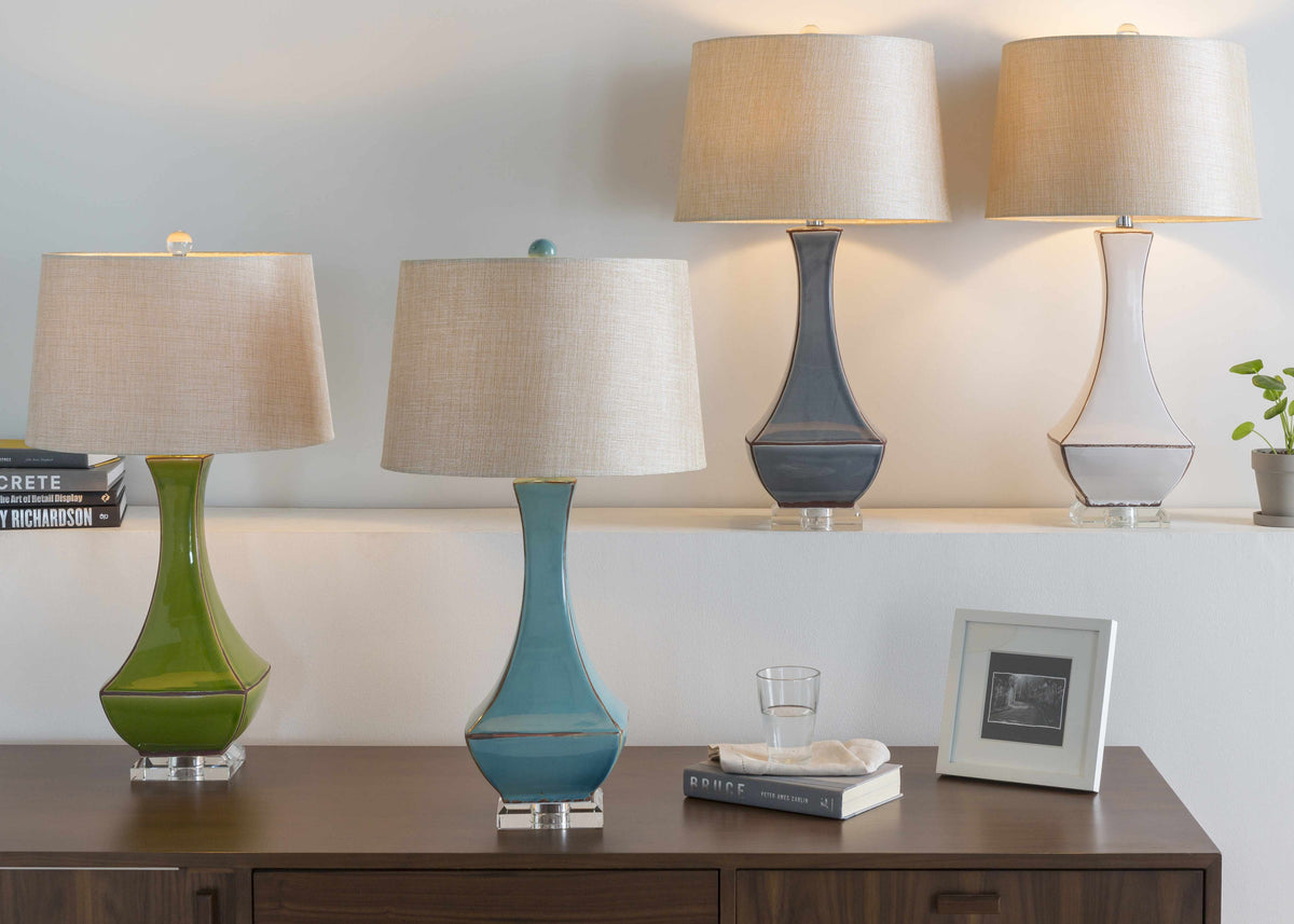 a group of lamps on a table