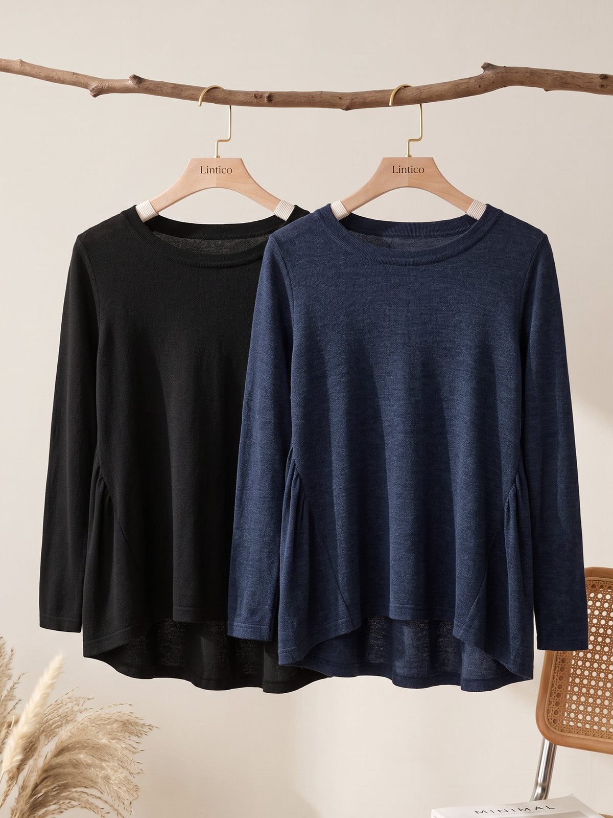 a pair of long sleeved shirts on swingers