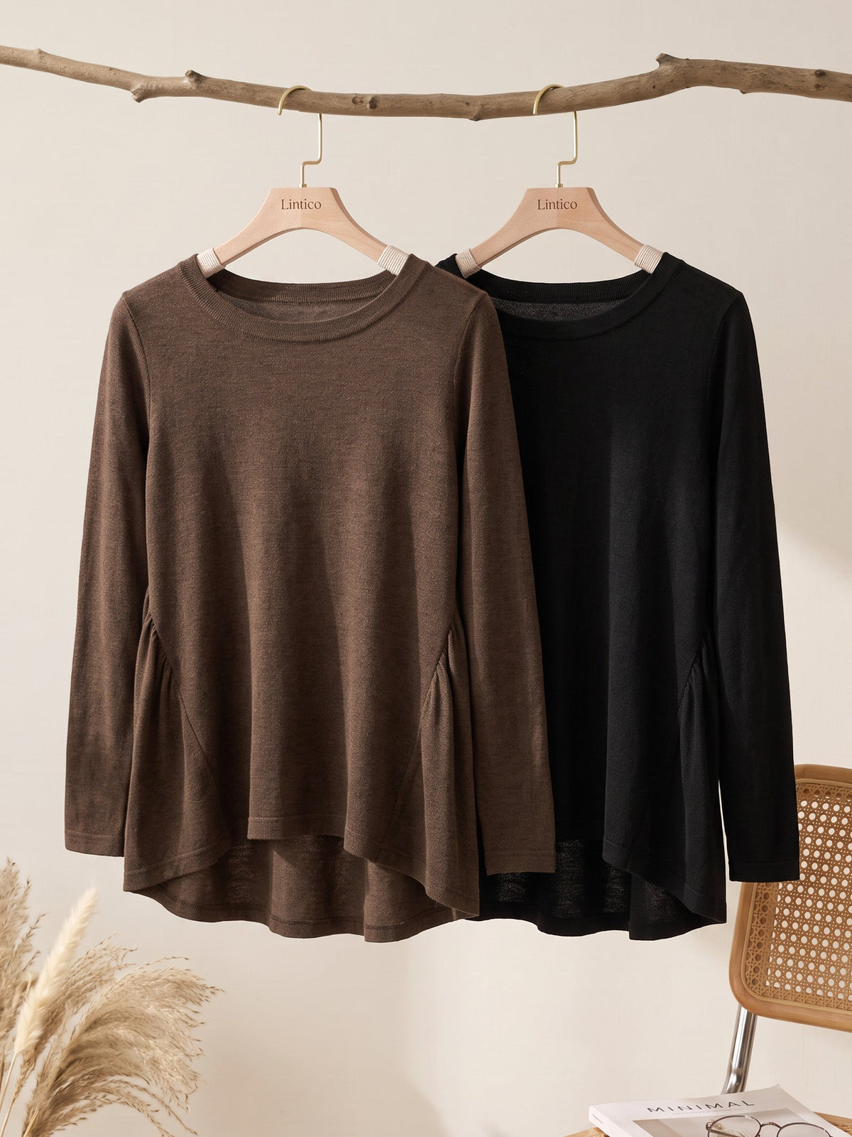 a pair of long sleeved shirts on swingers