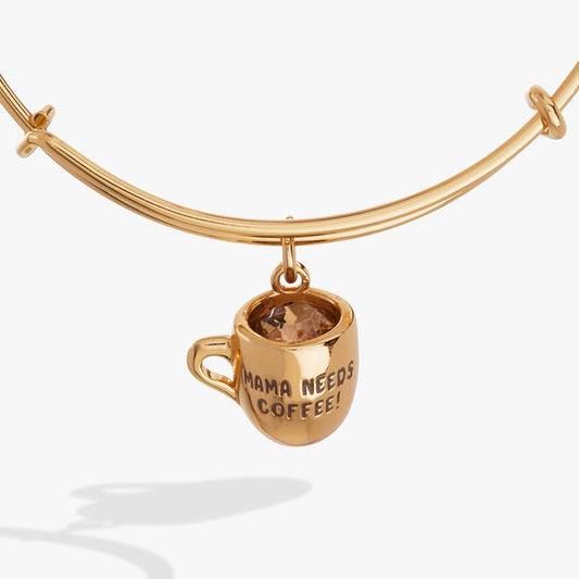 a gold necklace with a cup pendant