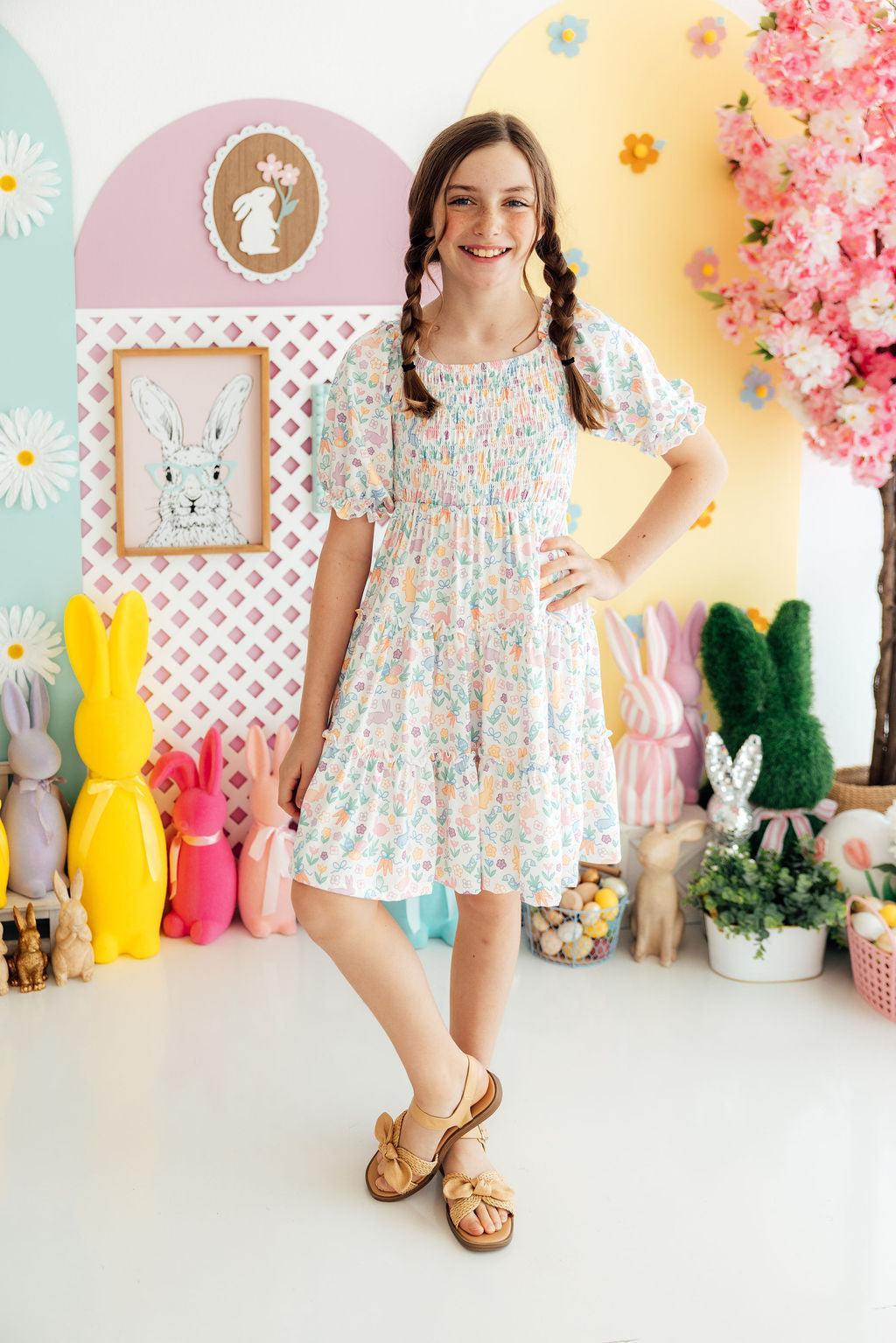 a girl in a dress