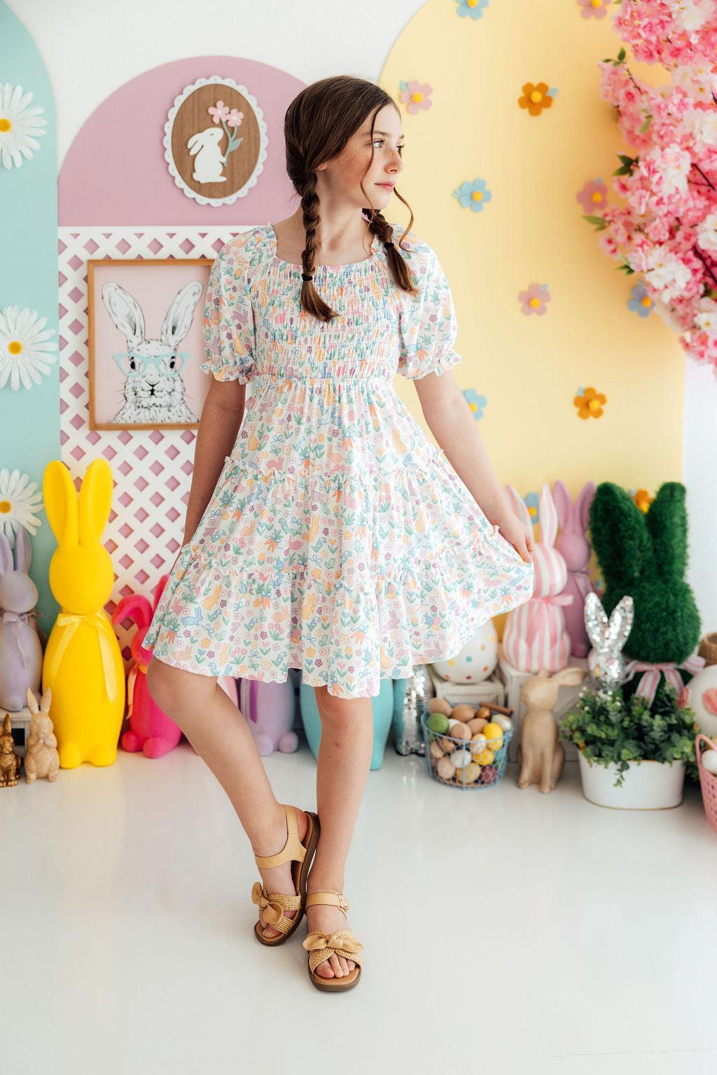 a girl in a dress