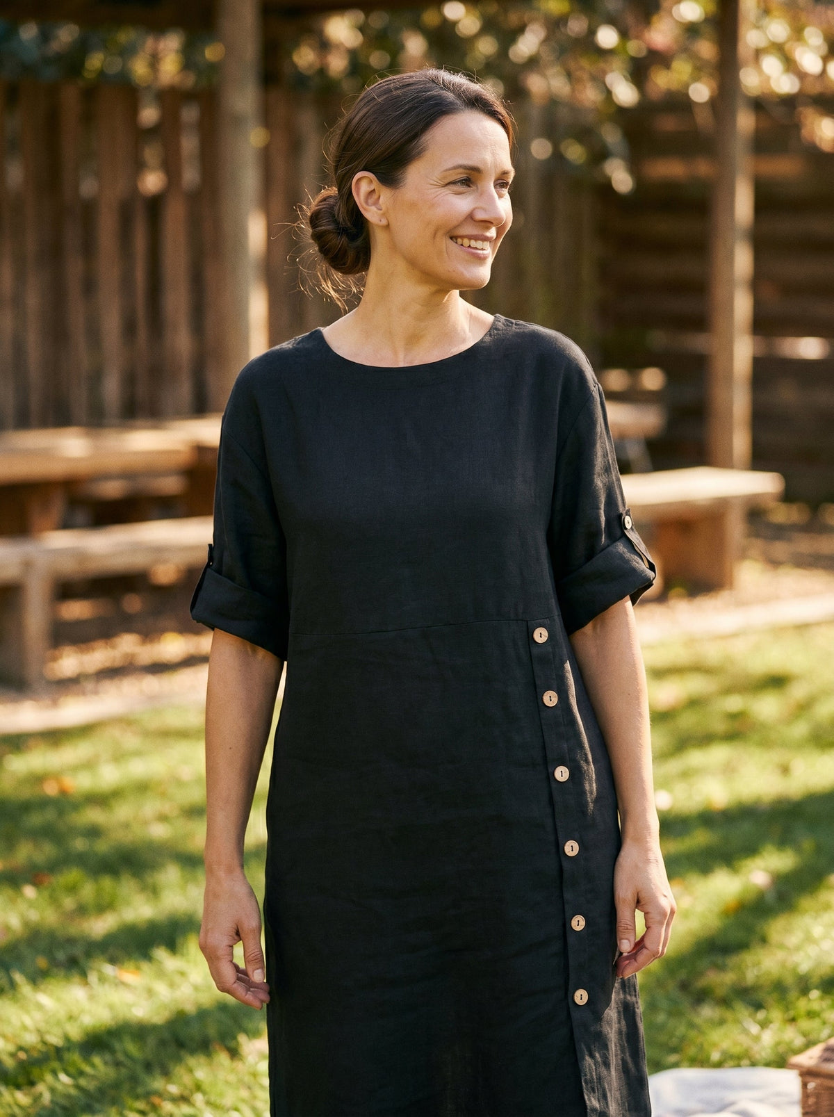 a woman in a black dress