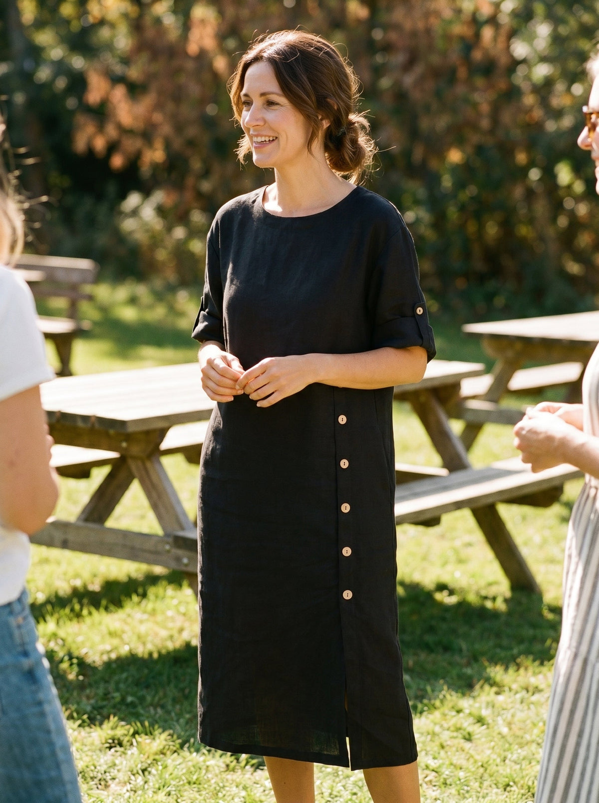 a woman in a black dress