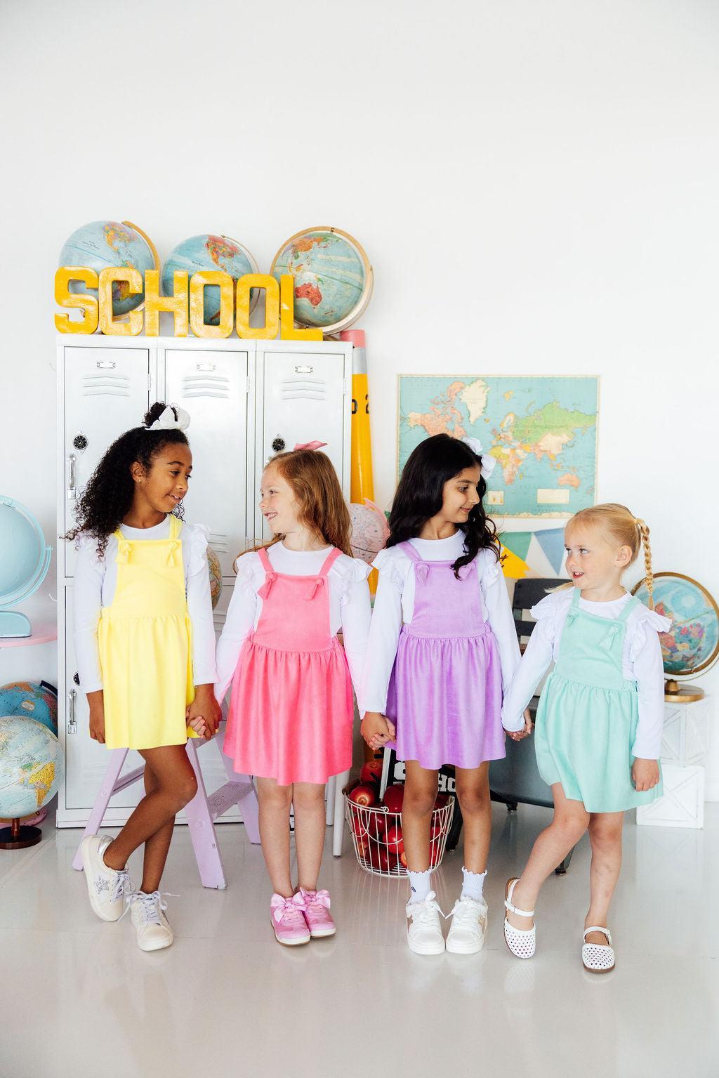 a group of girls in a classroom