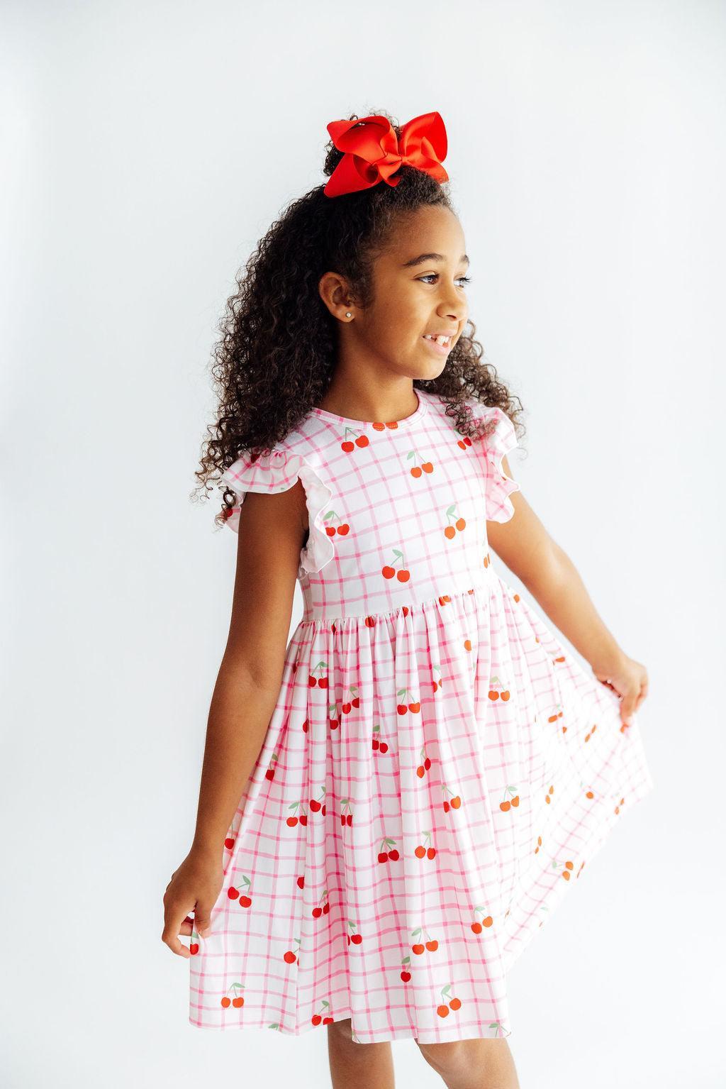 a girl in a dress