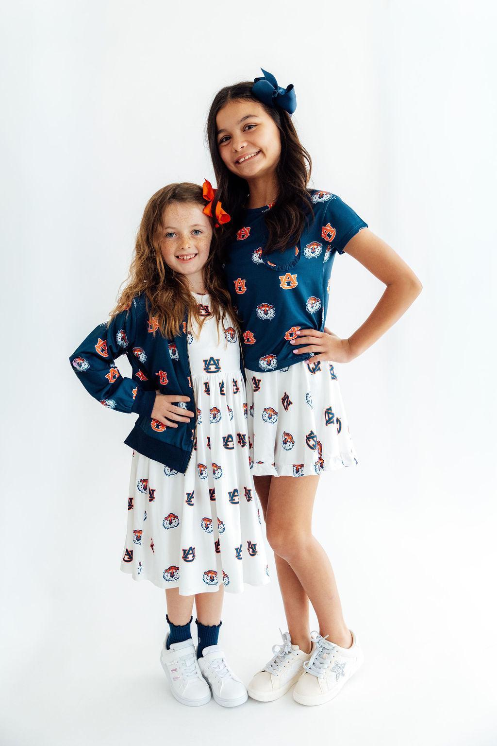 two girls posing for a picture