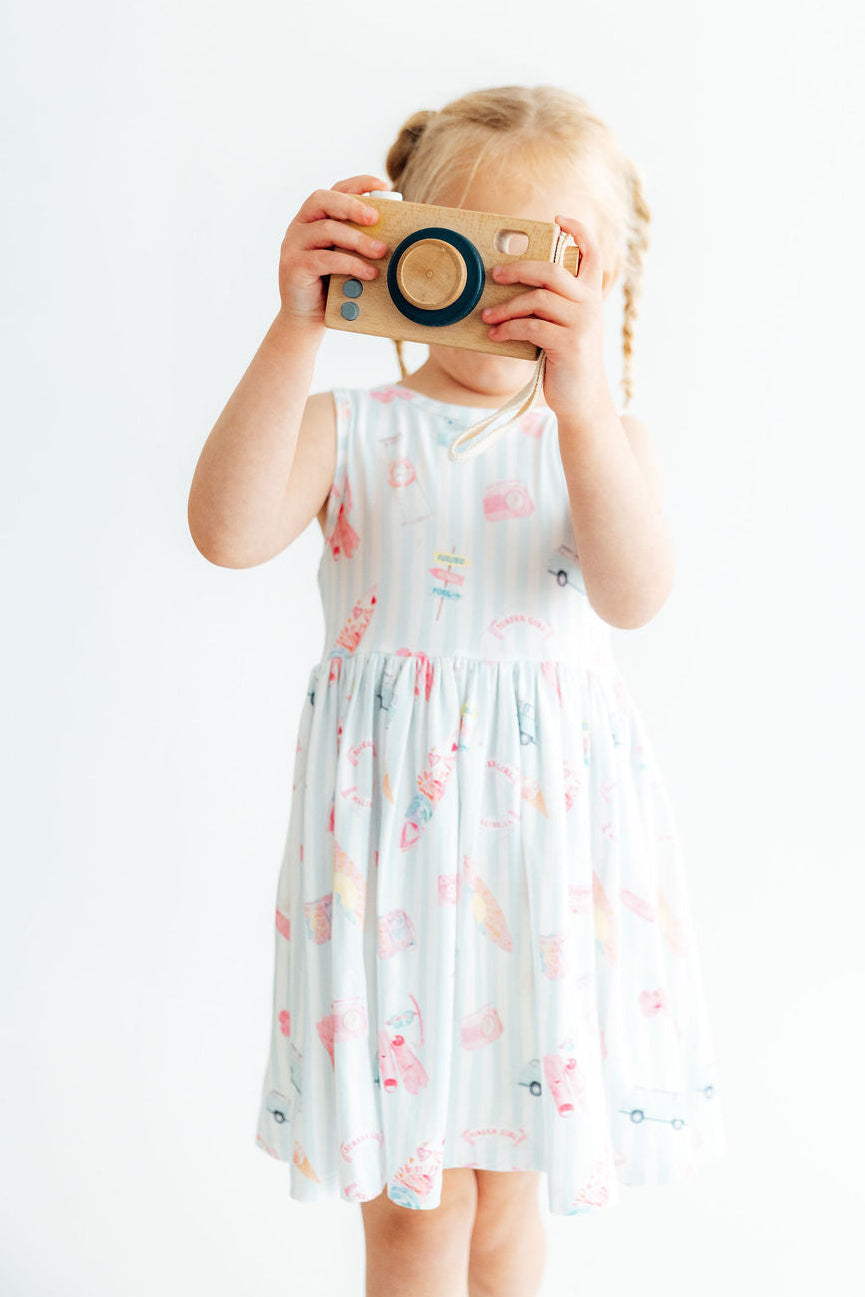 a girl holding a camera