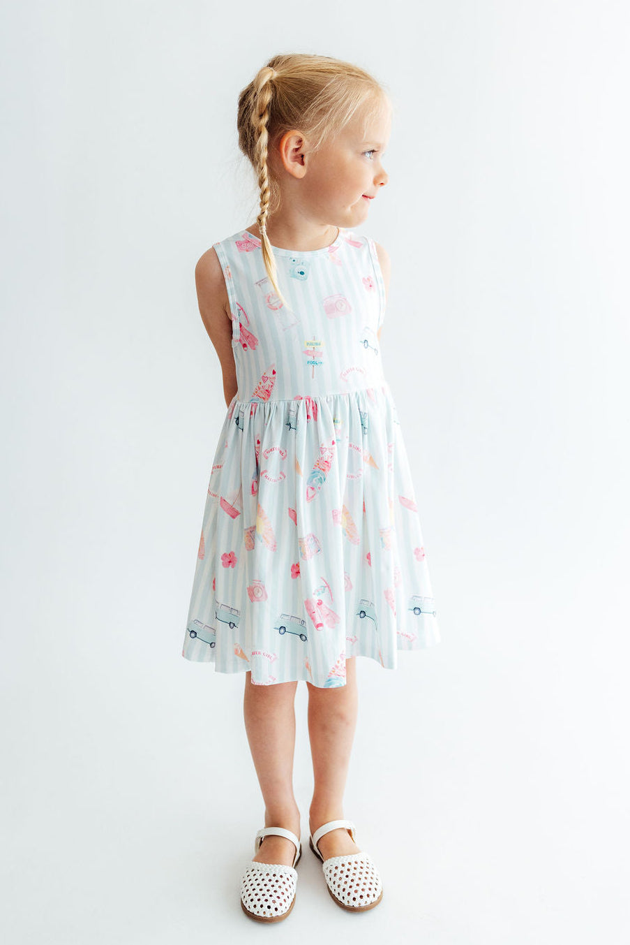 a girl in a dress