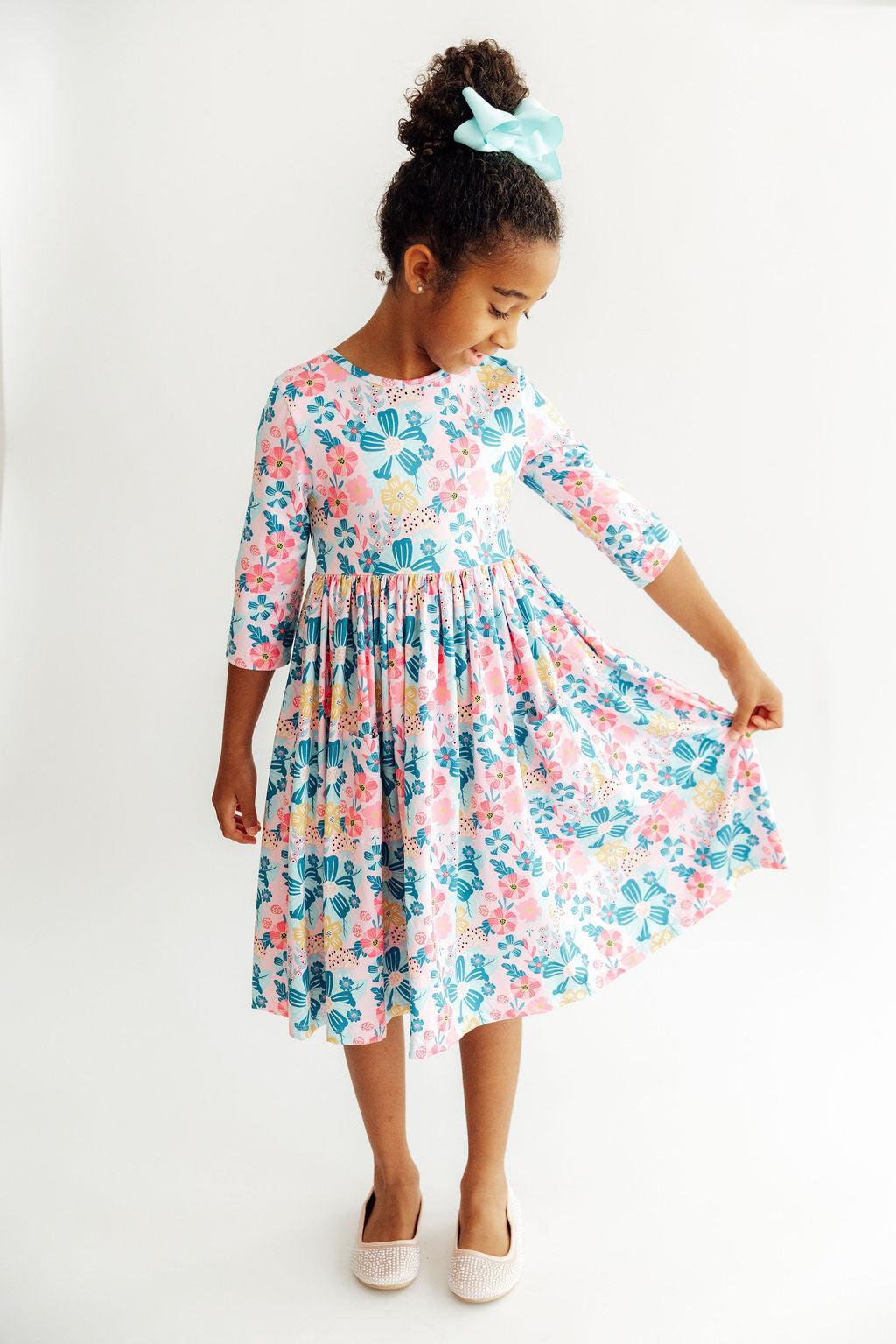 a girl in a dress