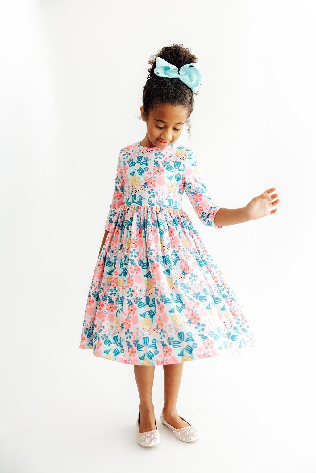 a girl in a dress