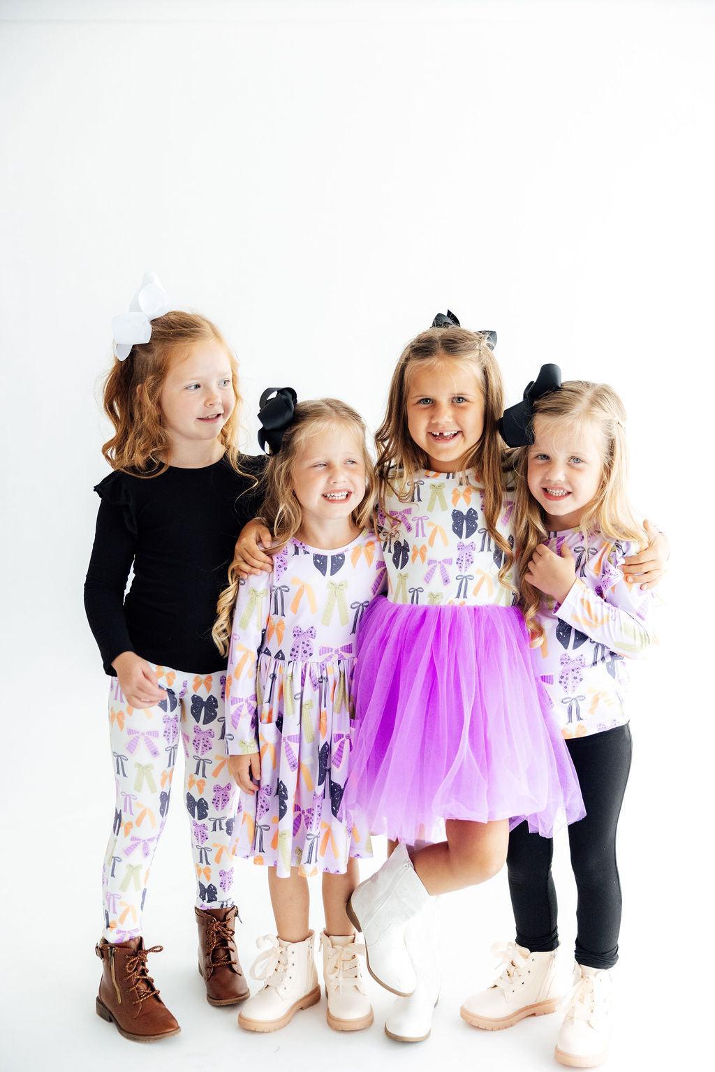 a group of girls posing for a picture