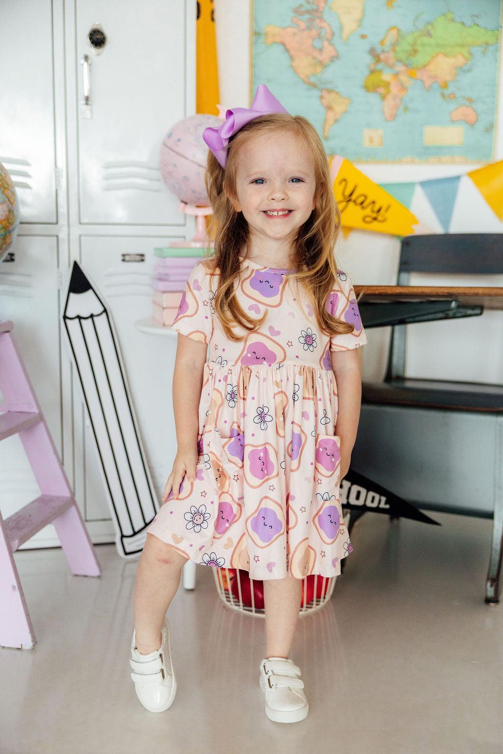 a girl in a dress