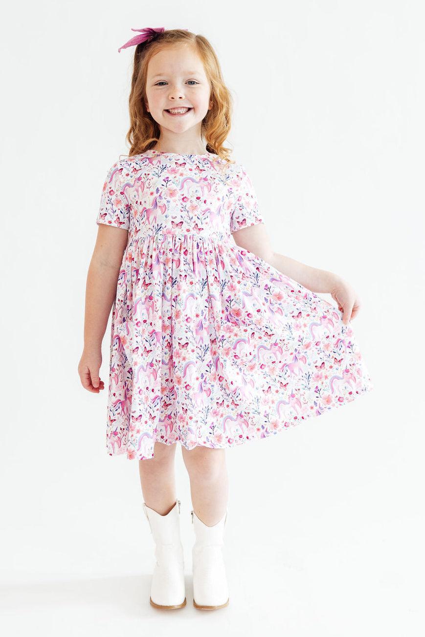 a girl in a dress
