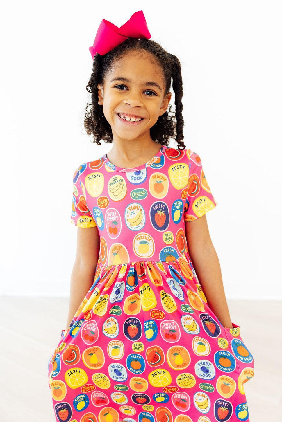 a girl smiling at the camera
