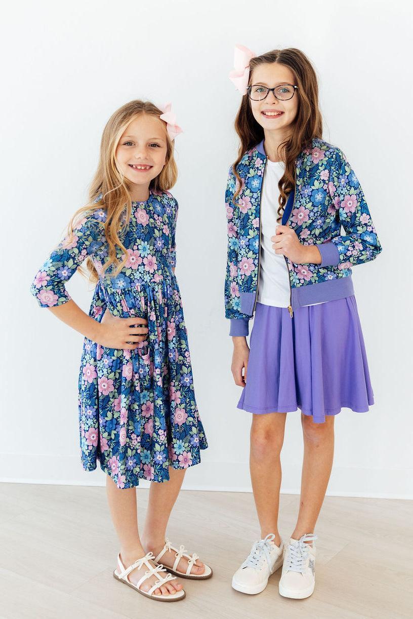 two girls posing for a picture