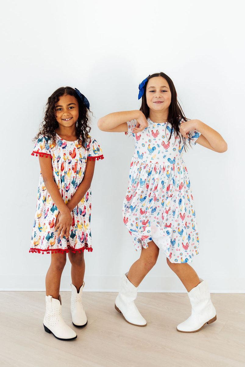 two girls posing for a picture