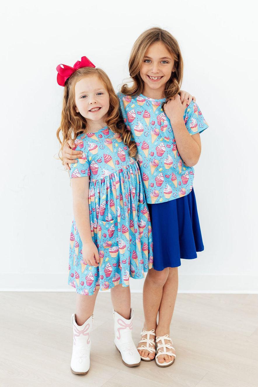 two girls posing for a picture