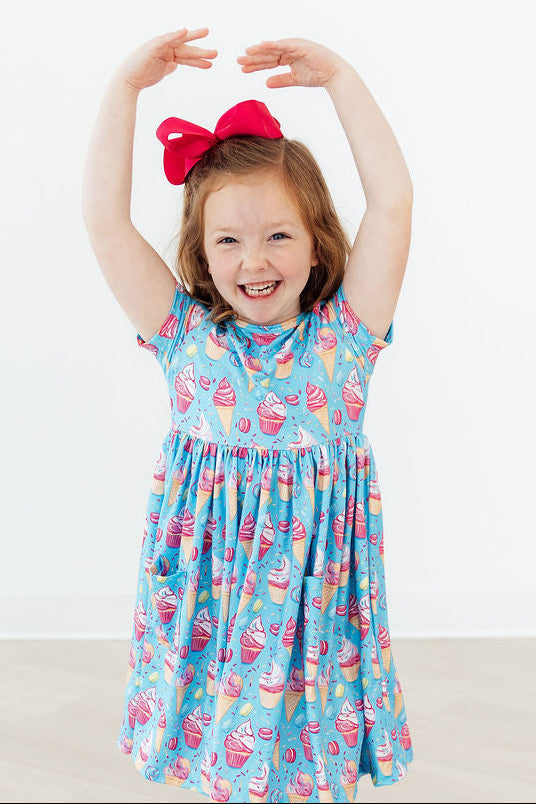 a girl with a red bow