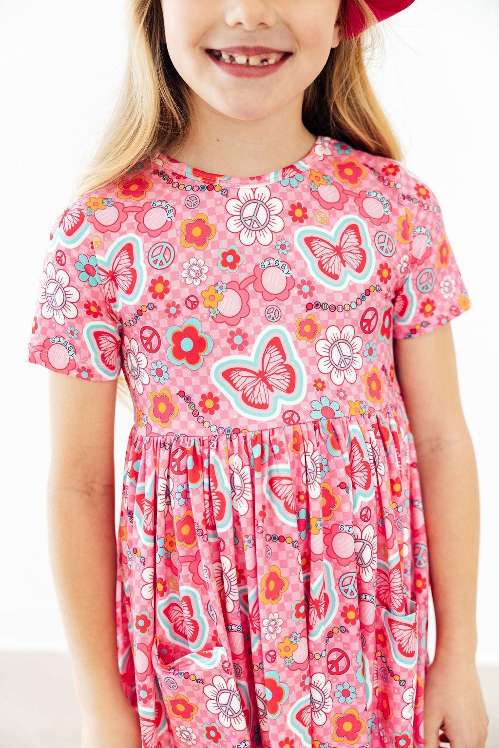 a girl wearing a pink dress