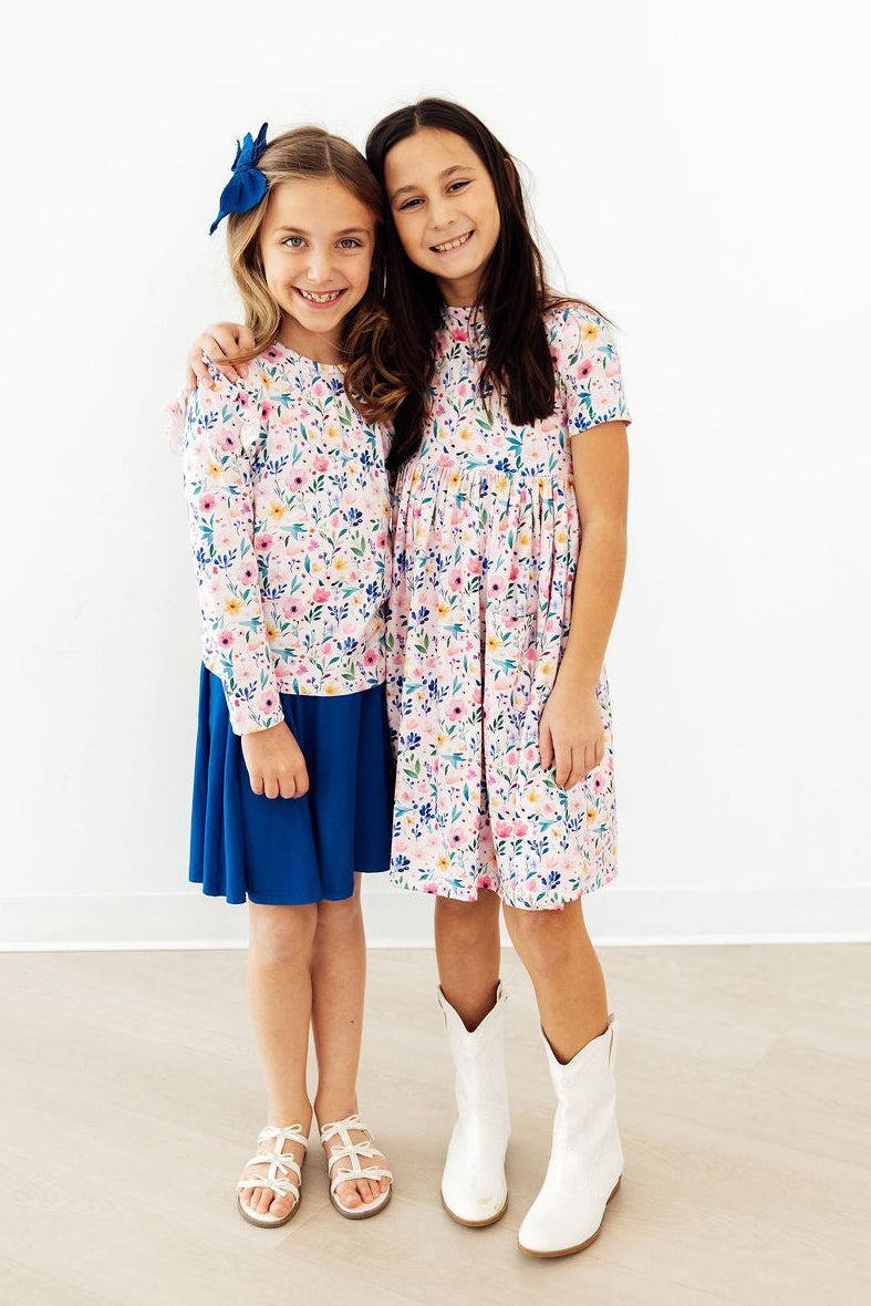 two girls posing for a picture