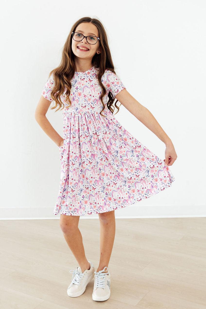 a girl in a dress