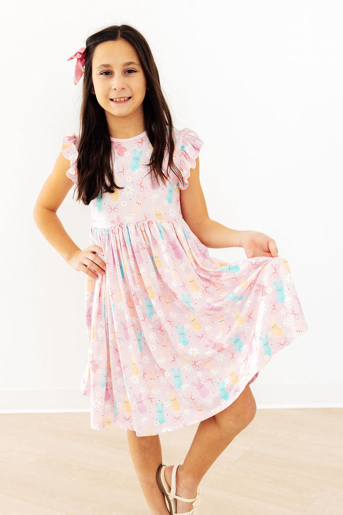a girl in a dress