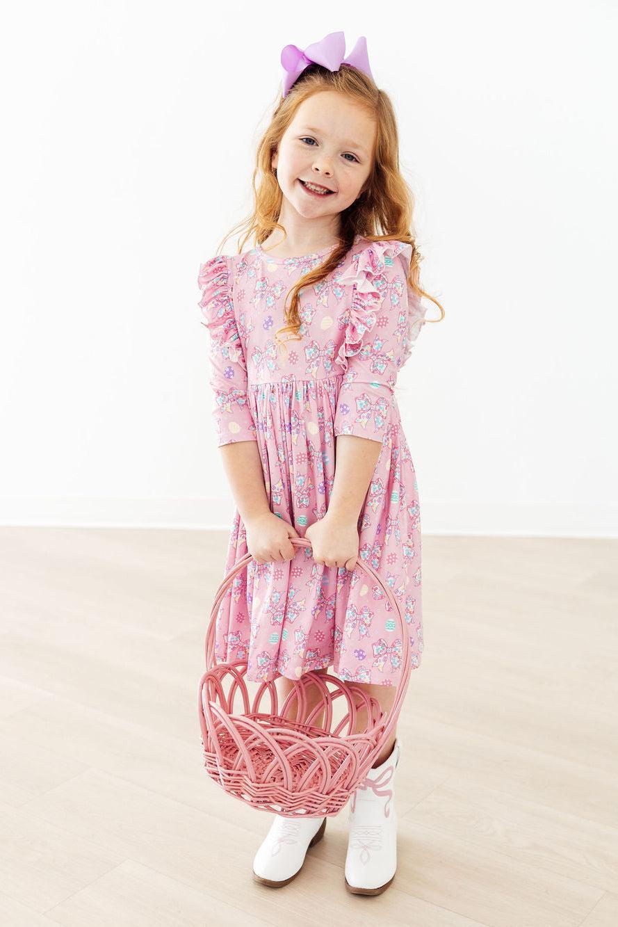 a girl holding a basket