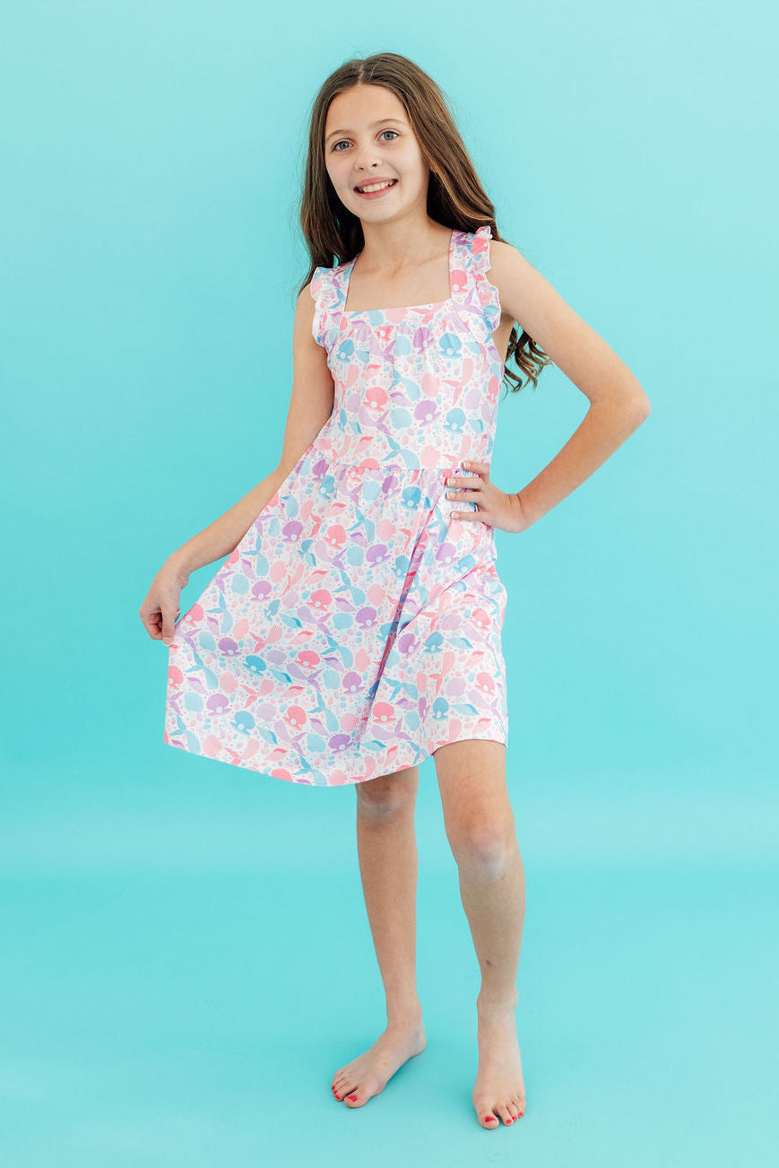a girl in a dress