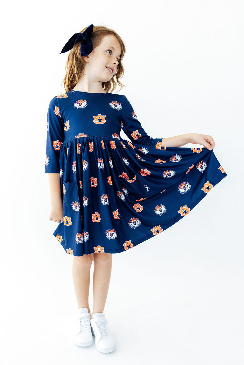 a girl in a blue dress