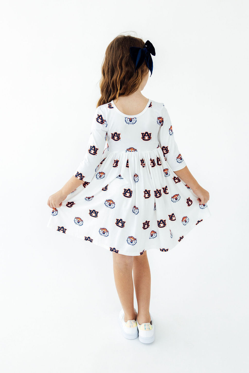 a girl in a dress